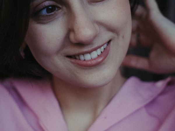 A person joyfully incorporating a wellness routine into their daily life schedule.